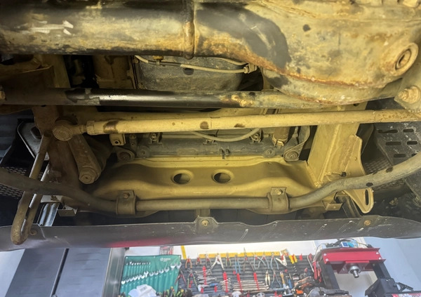 Suzuki Jimny cena 33900 przebieg: 166000, rok produkcji 2011 z Radomsko małe 497